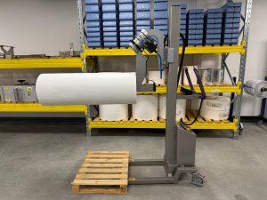 Packline  | Bespoke Roll Lifter for Handling Long, Wide Film Rolls 1