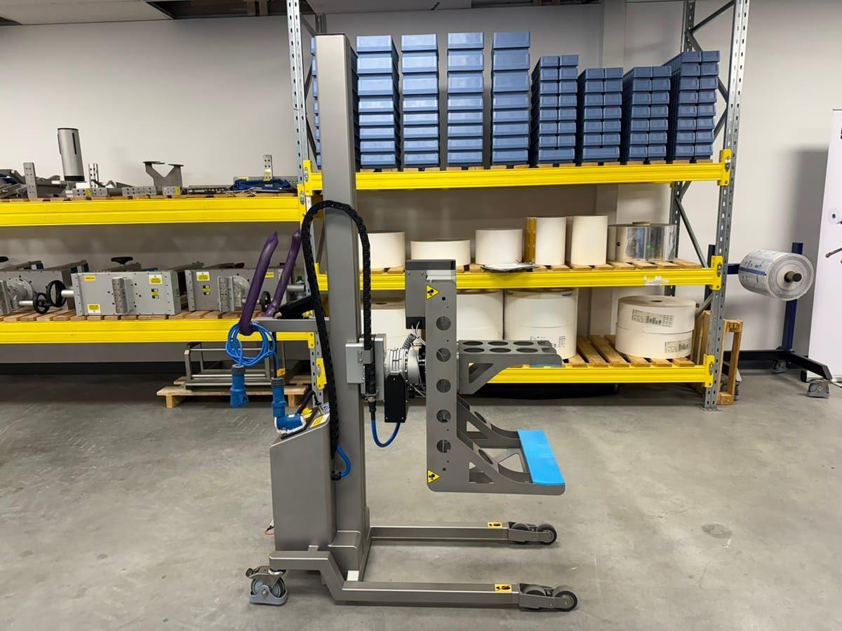 Packline  | Roll Lifter with Fixed Arm Clamp Design for Confined Food Production Areas 4